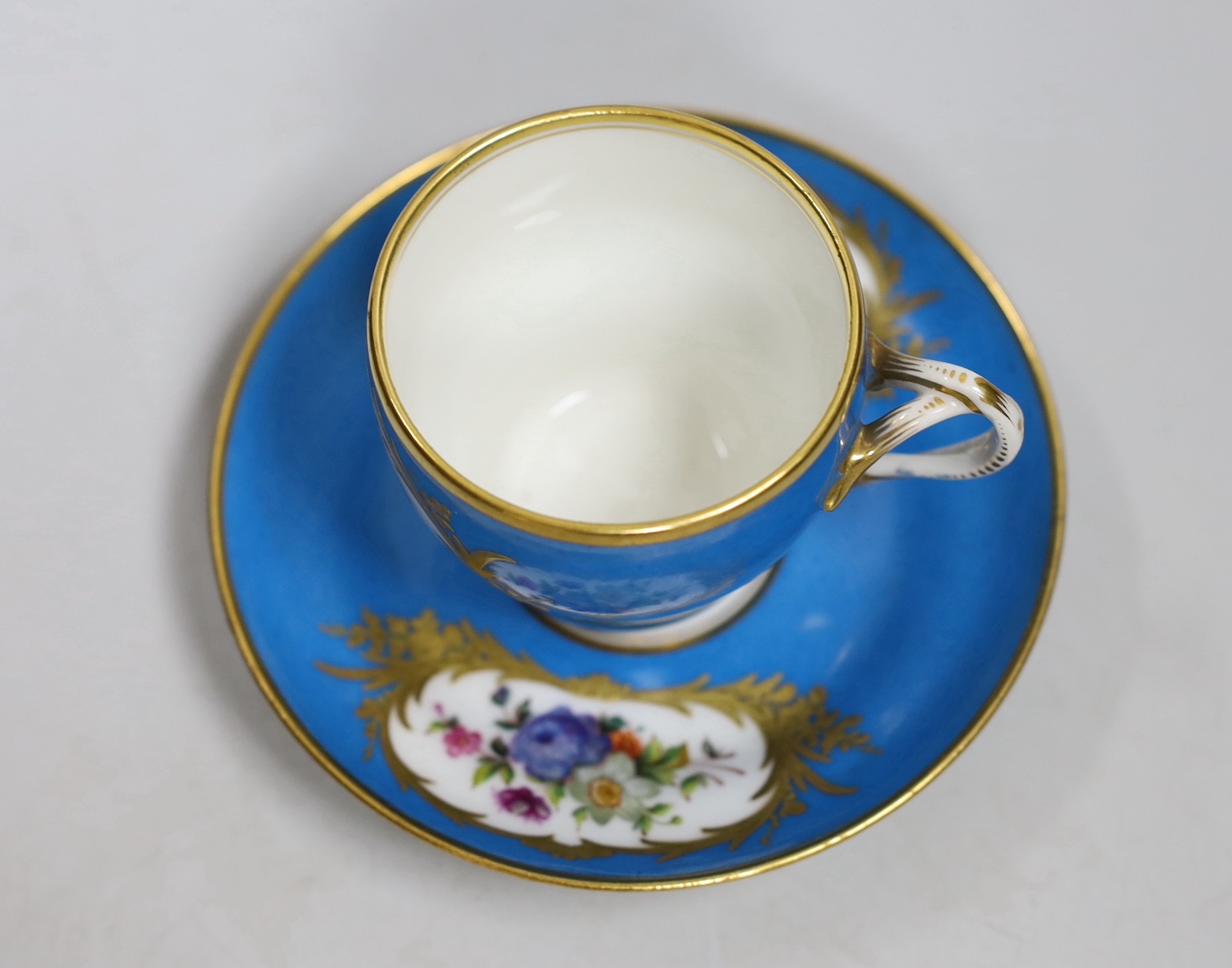A Paris porcelain Sevres style cup and saucer